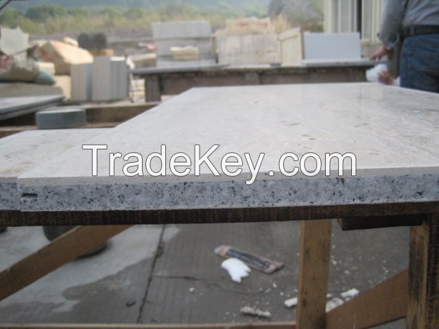 Natural stone laminated with granite and fiberglass