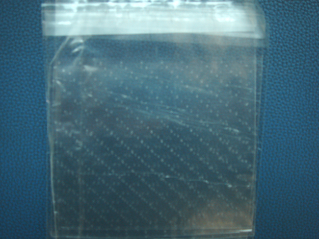 Micro perforate poly bag with adhesive tape