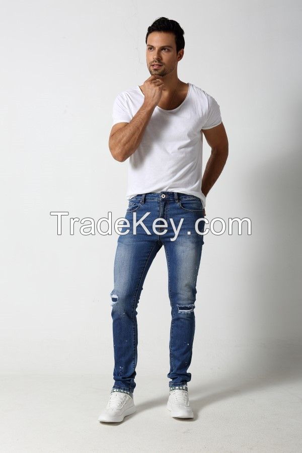 Men's Slim denim jeans with distressed and patches