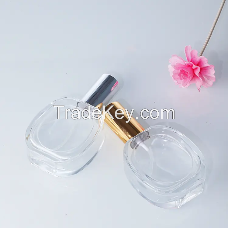 50ml Transparent Oval Shape Perfume Bottle Mist Spray Top Glass Bottle with Golden Sliver Lid