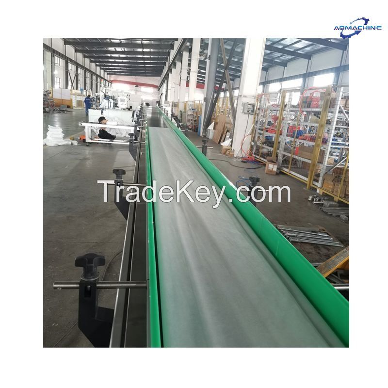 Nonwoven mulch folding machine