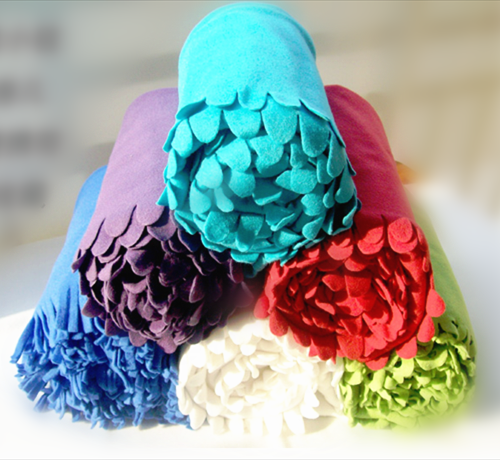 Polar fleece throws with ruffles