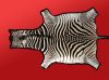 ZEBRA SKIN RUG AND AFR...