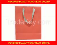 2016 fancy and cheap shopping paper bags with ribbon handles