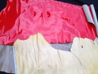 Scraps from shiny leather cutting