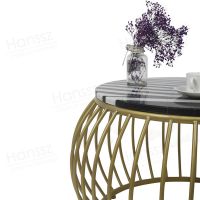 Metal frame marble top round coffee table