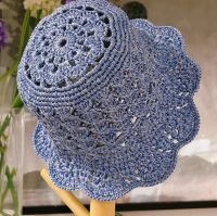 Hand-knitted sun hat for travelling