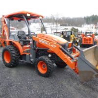 Fairly used  FREE DELIVERY KUBOTA M62 TLB Front Loader and Backhoe
