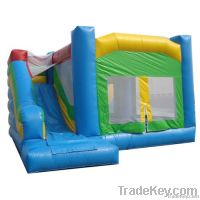 blue and green inflatable bouncer house & slide