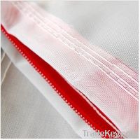 Multi-color mesh tarp