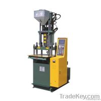 vertical screw injection molding machine