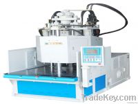 vertical screw injection molding machine