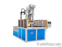 vertical screw injection molding machine