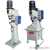 Pneumatic spin riveting machine