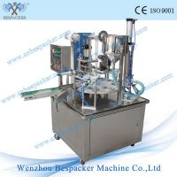 Rotary cup roll film filling and sealing machine